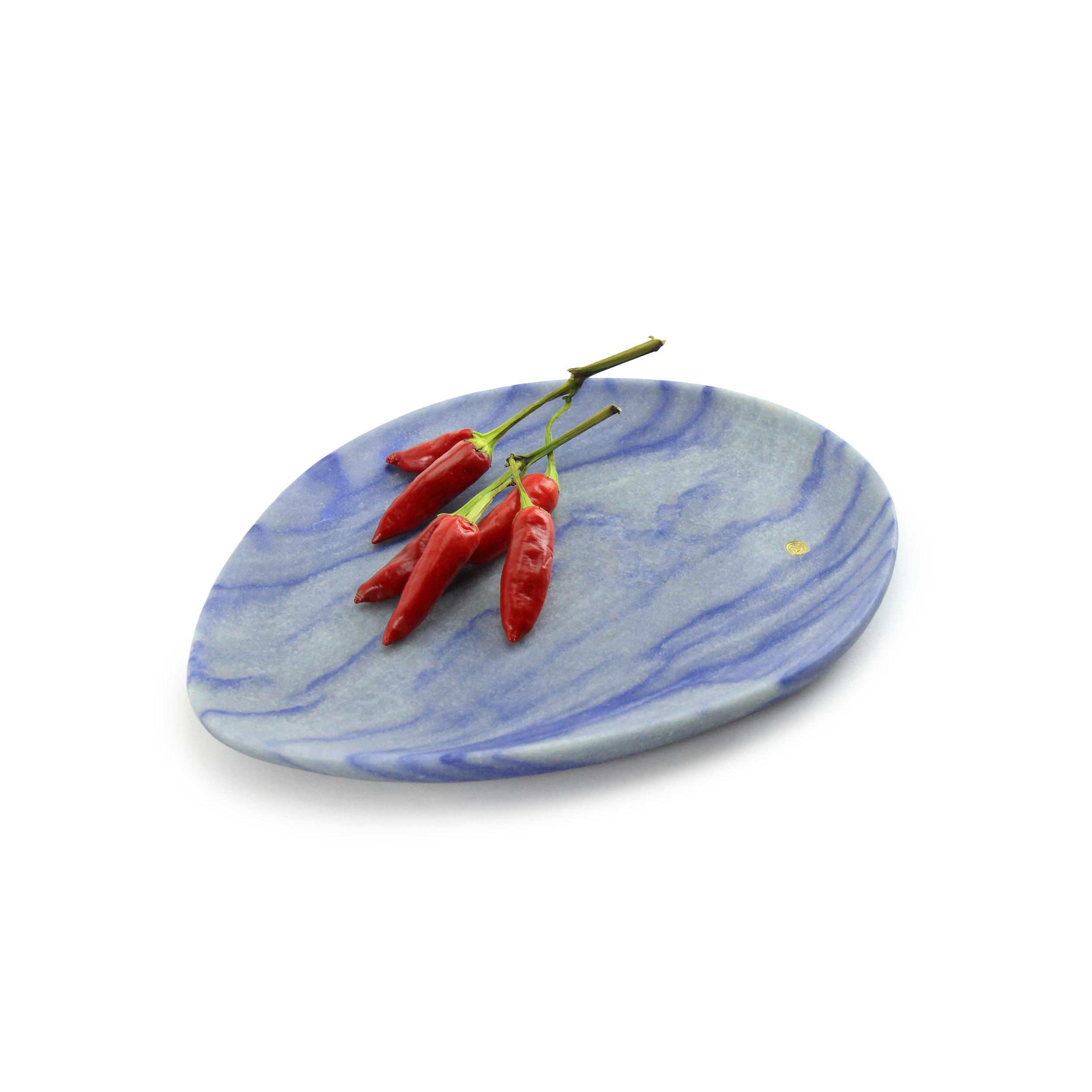 Hand carved presentation plate from semi-precious quartzite Azul Macaubas.
Multiple use as plates, platters and placers. 

Dimensions: Small L 24, W 20, H 1.8 cm, also available: Medium L 30, W 28, H 1.8 cm, big L 36, W 35, H 1.8 cm.
Available in