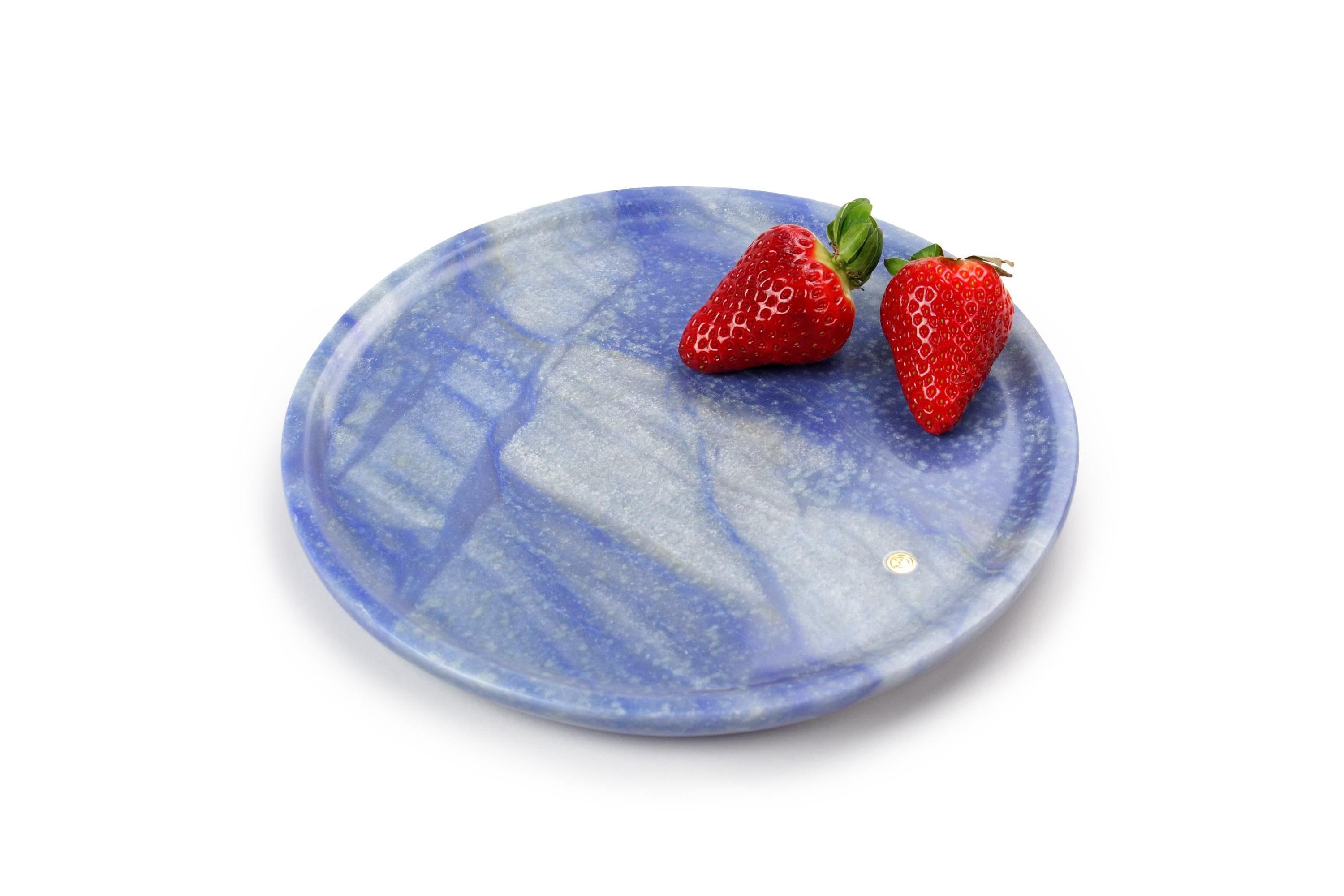 Hand carved circular presentation plate from semi-precious quartzite Azul Macaubas.
Multiple use as plates, platters and placers. 

Dimensions: D 22, H 1.2 cm. Available in different marbles, onyx and quartzite. 

100% Hand made in Italy.

Marble is