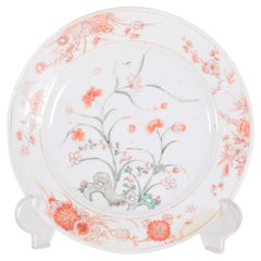 Plato, en porcelana china de exportación. Decoración policromada