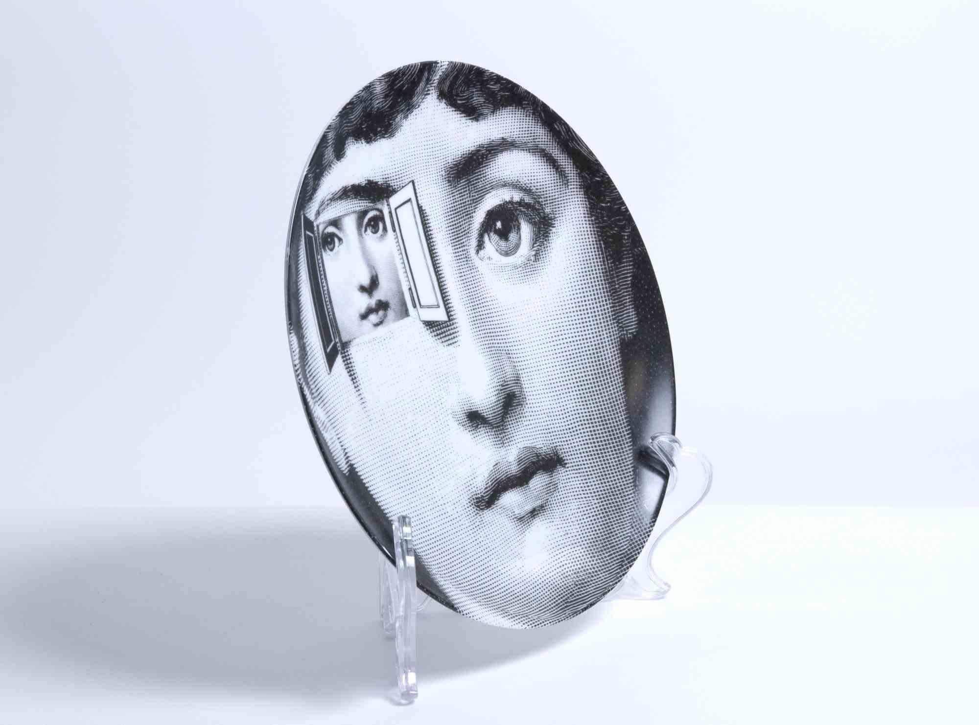 Iconic ceramic plate with black and white screen print on the surface, depiting Lina Cavalieri (Fornasetti's Muse), designed by Piero Fornasetti in the mid-20th Century.

From the series 