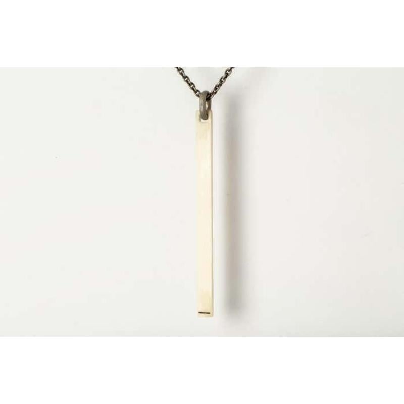 Handcarved plate necklace made of buffalo bone, it comes on a 74cm sterling silver chain.