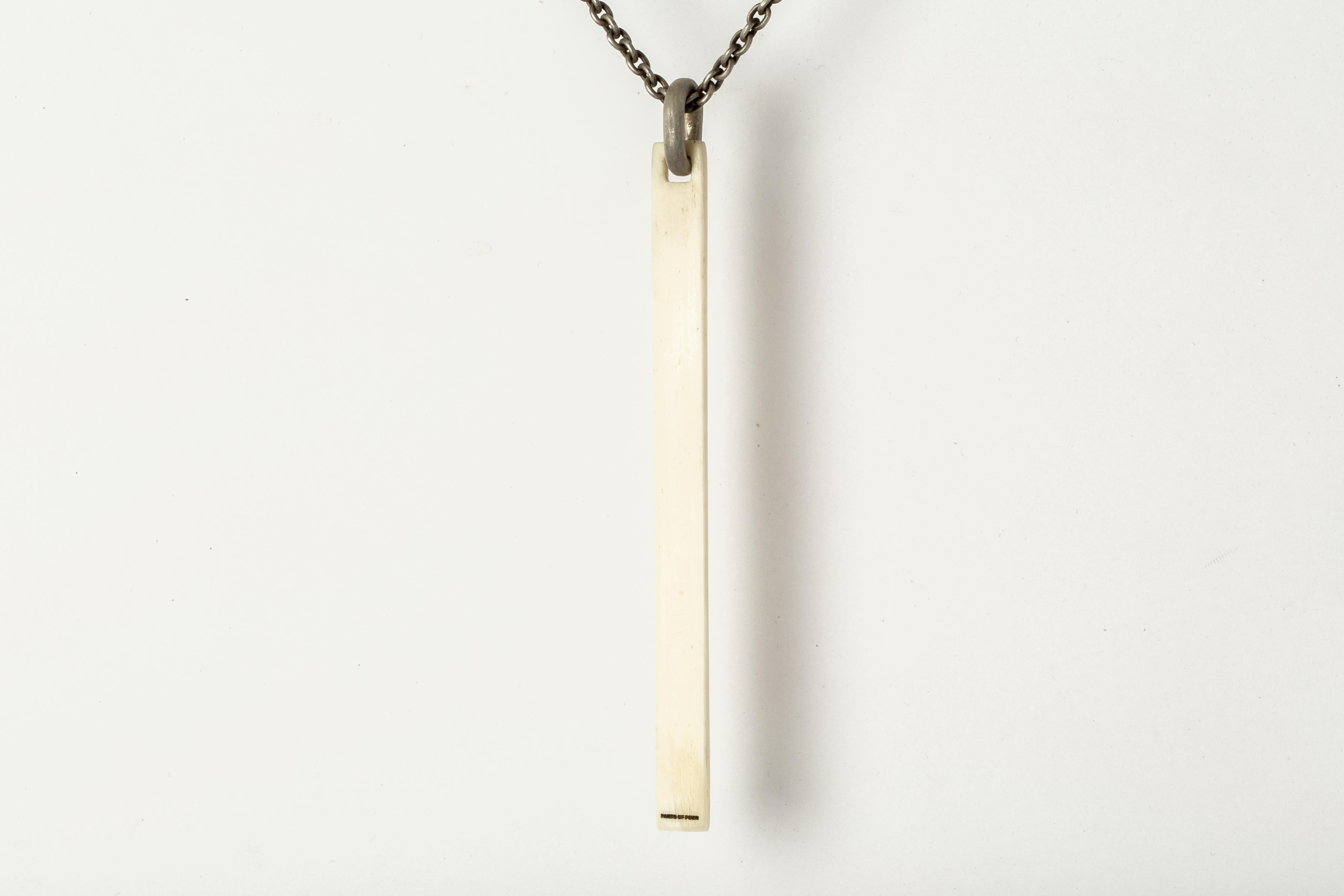 Handcarved plate necklace made of buffalo bone, it comes on a 74cm sterling silver chain.