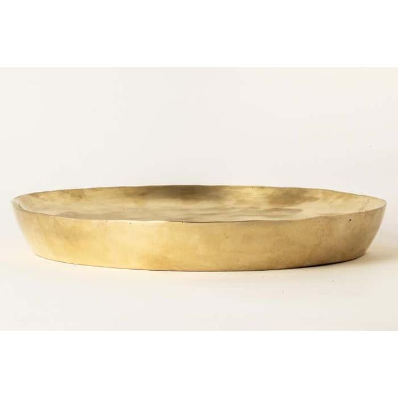 This plate is hand-made in brass. Crafted with meticulous care, it is a masterpiece of metalwork. Every inch is a testament to artisanal skill, with each section cut and shaped by hand. The result is a three-dimensional marvel that marries