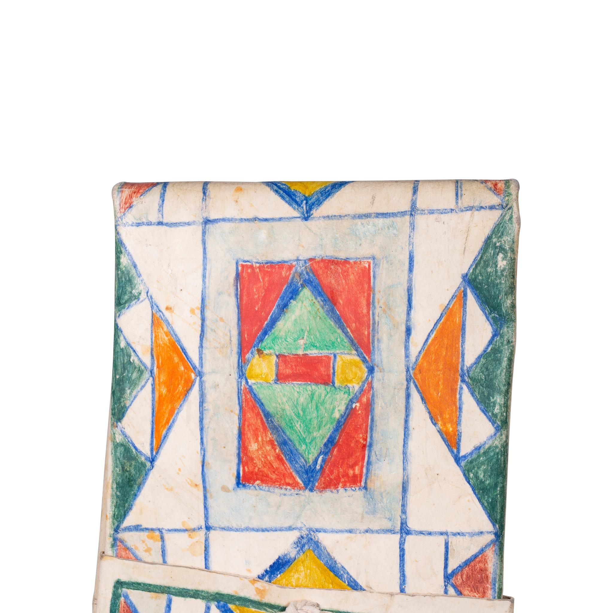 Plateau painted parfleche envelope painted in green, blue, orange, yellow and red.

Period: circa 1900
Origin: Plateau
Size: 28