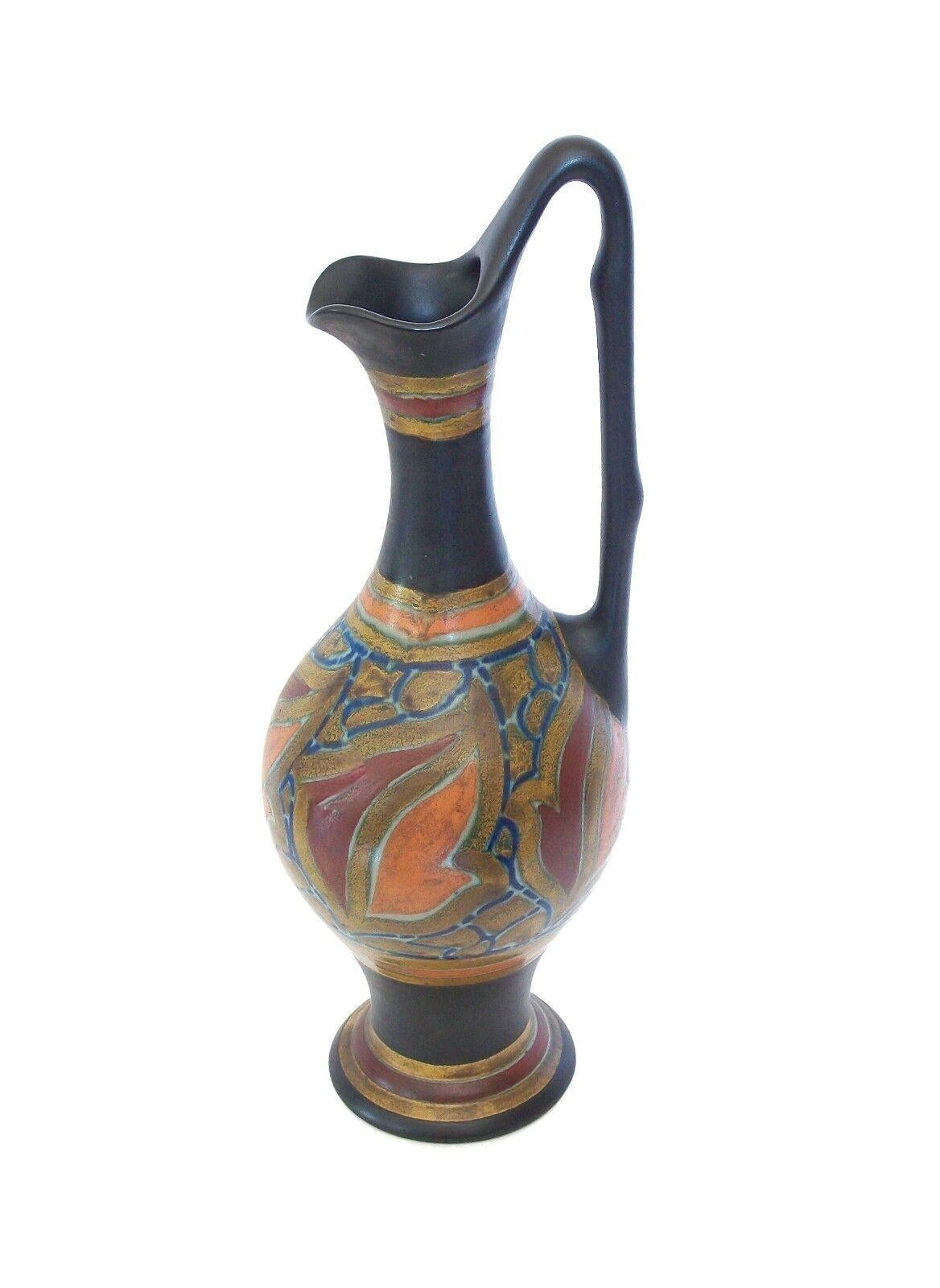 Plateelbakkerij- Antique Gouda Art Nouveau ceramic ewer - large size - matte finish glaze with hand painted leaf pattern and triple line borders - remnants of original Plateelbakkerij Zuid-Holland paper label on the base - also signed on the base -