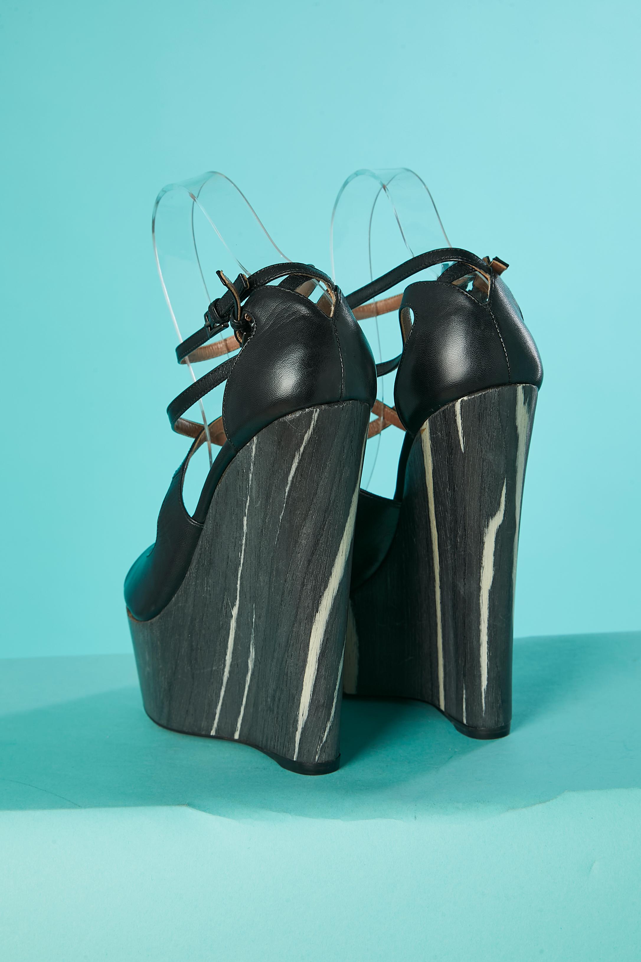 Plateform sandal in black leather and wood pattern heels Alaïa  In New Condition For Sale In Saint-Ouen-Sur-Seine, FR