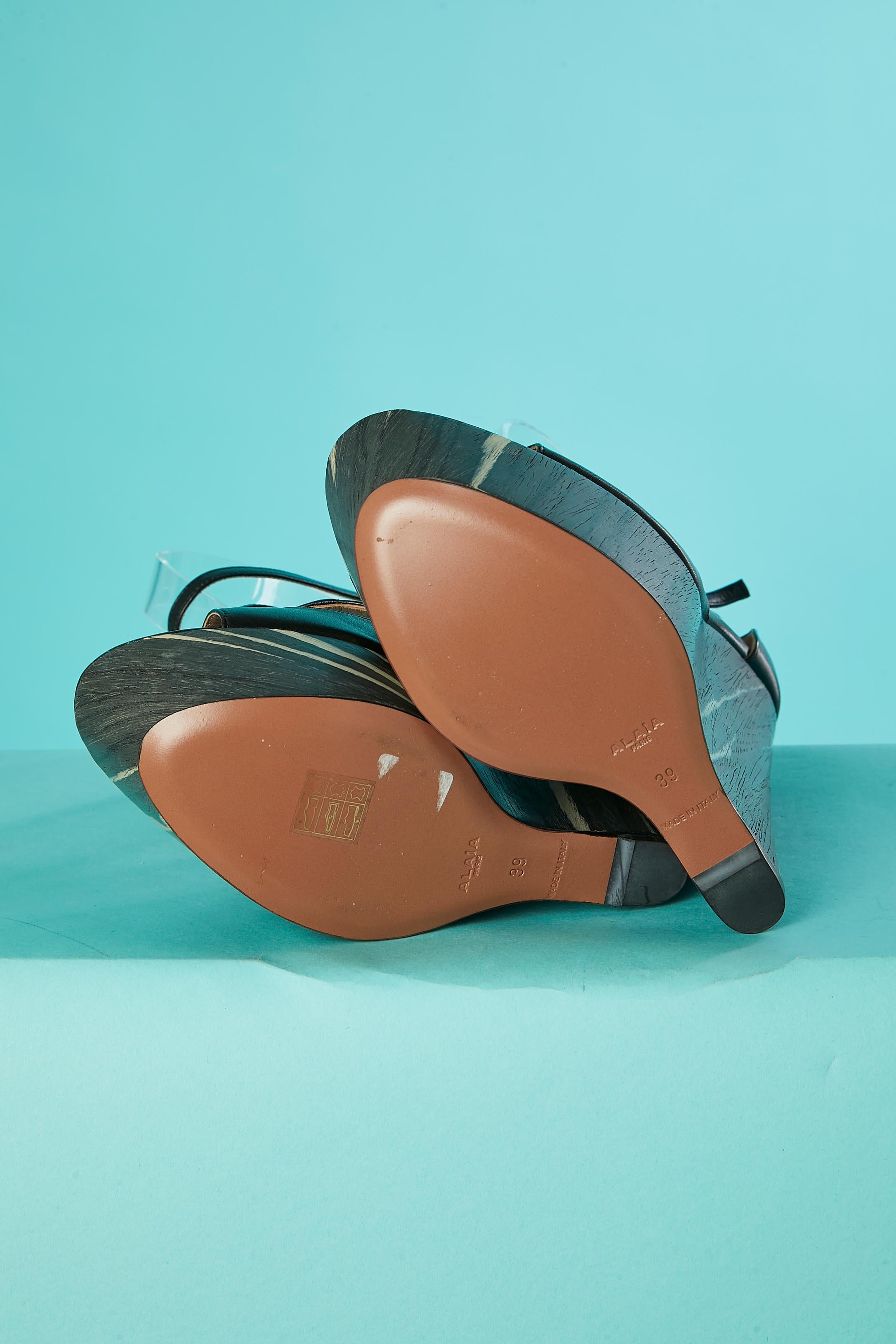 Women's Plateform sandal in black leather and wood pattern heels Alaïa  For Sale