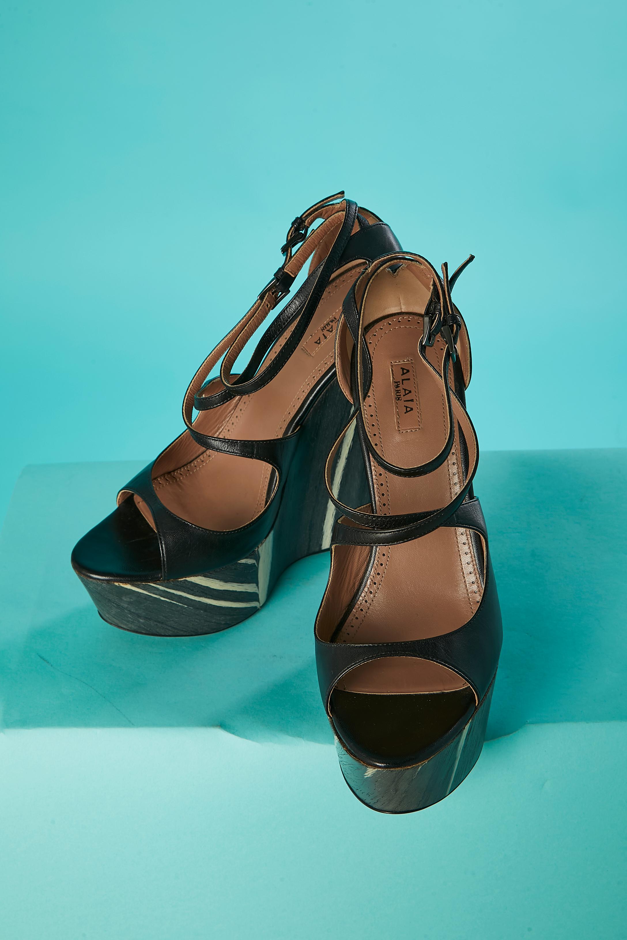 Plateform sandal in black leather and wood pattern heels Alaïa  For Sale 1