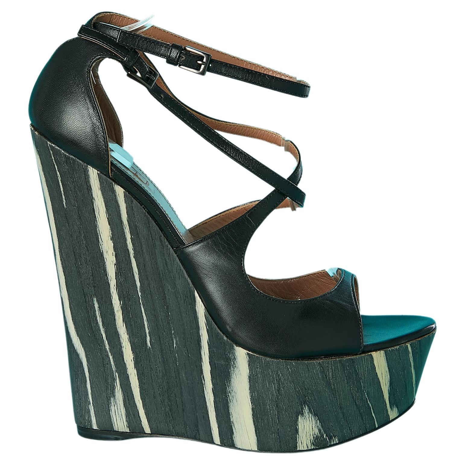 Plateform sandal in black leather and wood pattern heels Alaïa  For Sale