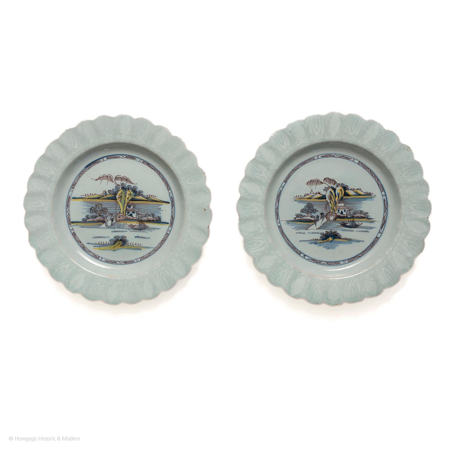 Charming pair of plates with rare and desirable features of delftware; fluting, bianco-sopra-bianco border and in polychrome including manganese
From a Bristol collection and originally made in Bristol
 
Pair of 18th century bianco-sopra-bianco