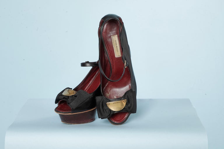 Platform sandal in black leather with "gros-grain" bow and metal Nina Ricci  For Sale at 1stDibs | gros metal