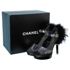 Platform sandals in transparent plastic and black feathers Chanel 
