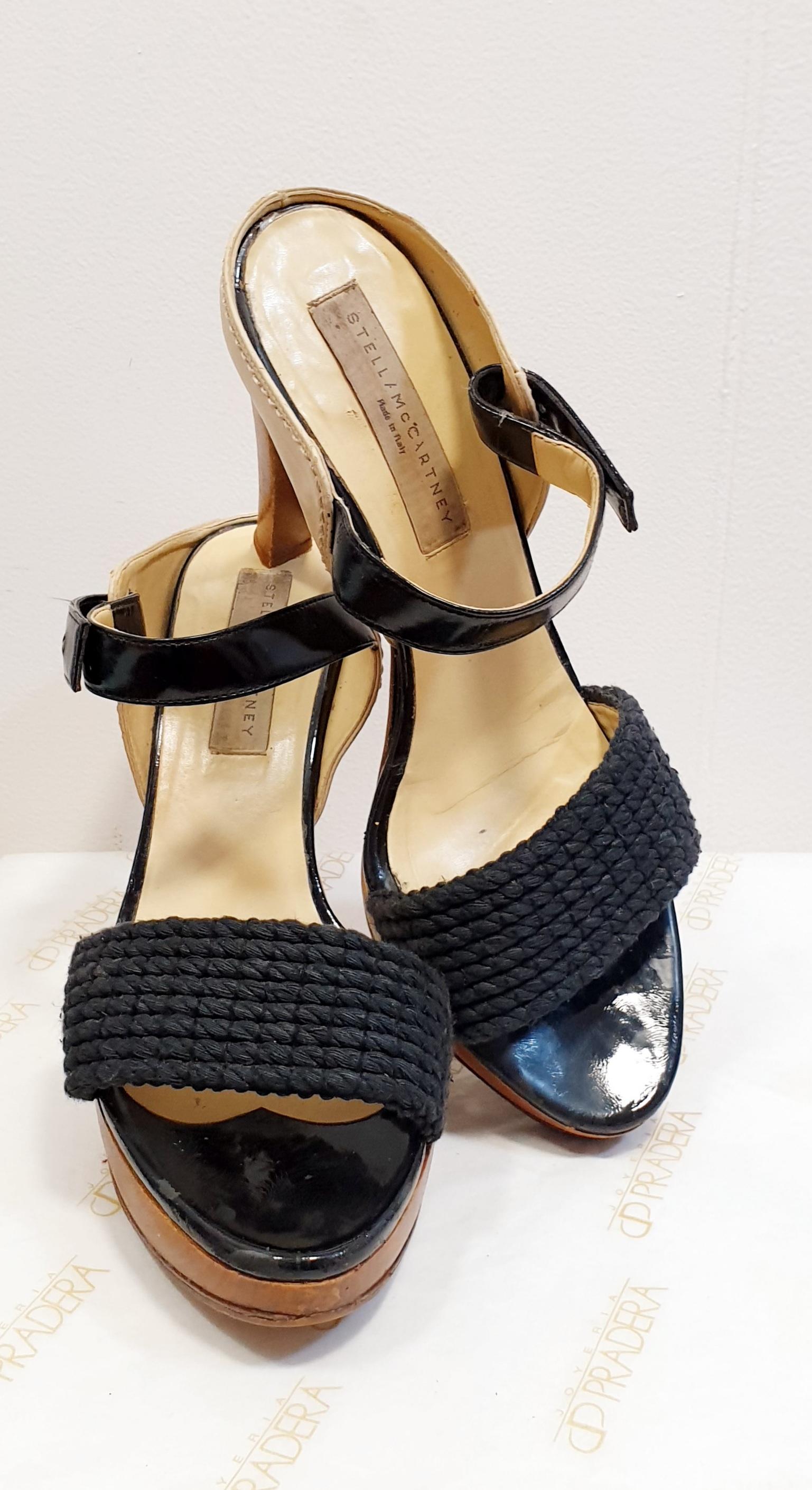 Platform Sandals  Stella McCartney Cotton and Patent Leather Sandals with Wooden Heel

Made In: Italy
Color: Black
Materials: Cotton and Patent Leather
Marked Size: 39,5 Europe
Heel Wedge : 11cm 4,33 inches 
Platform Height:  2,5cm 0,98