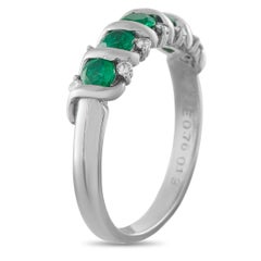 Anello in platino con diamante e smeraldo da 0,13 carati MF13-041426