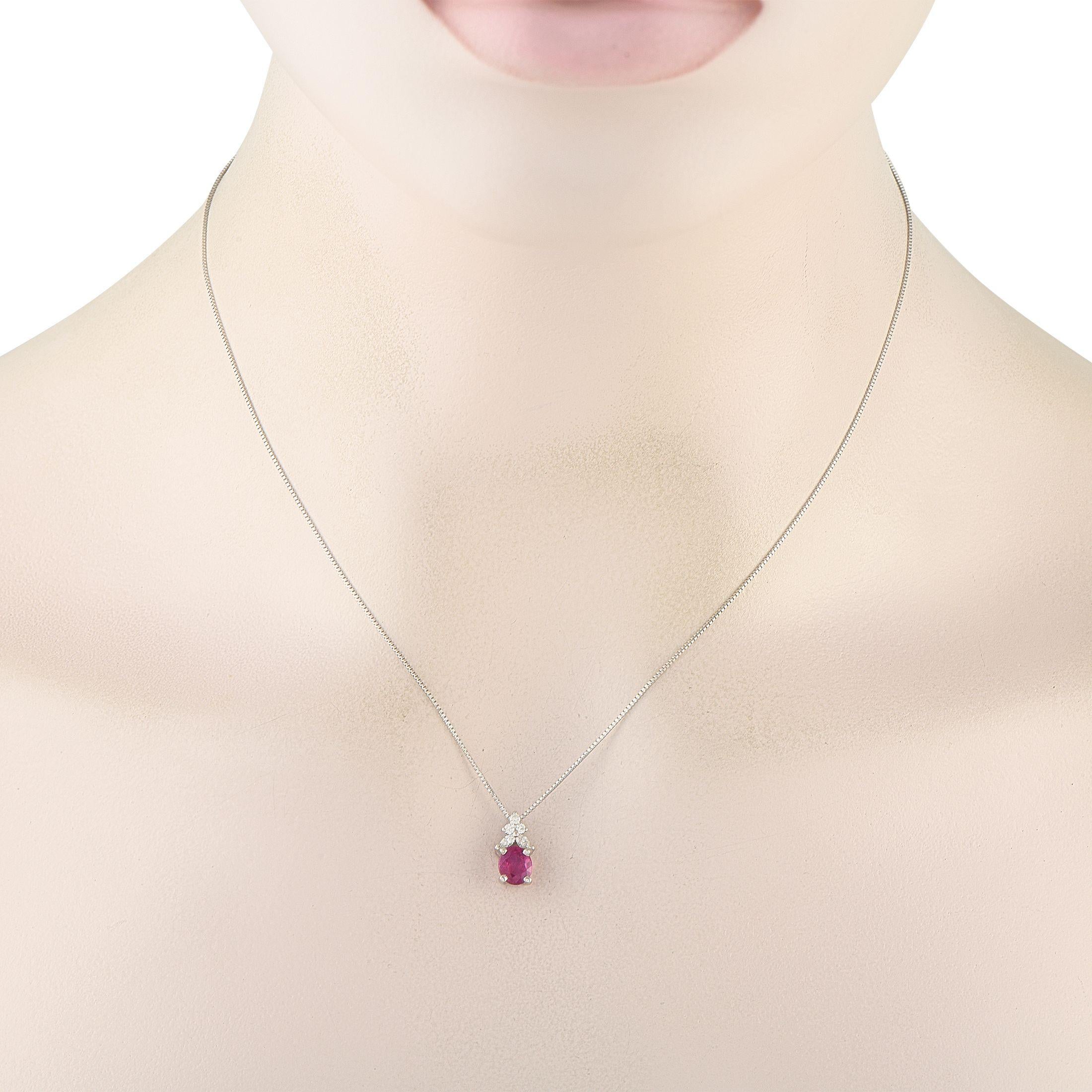 This necklace is poised to add a subtle touch of luxury to any ensemble. Sleek and stylish, the Platinum pendant showcases a 1.06 carat Ruby center stone and Diamond accents totaling 0.14 carats. The pendant measures 0.50 long by 0.25 wide and is