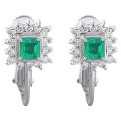 Orecchini in platino con diamanti e smeraldi da 0,21 carati MF37-031326