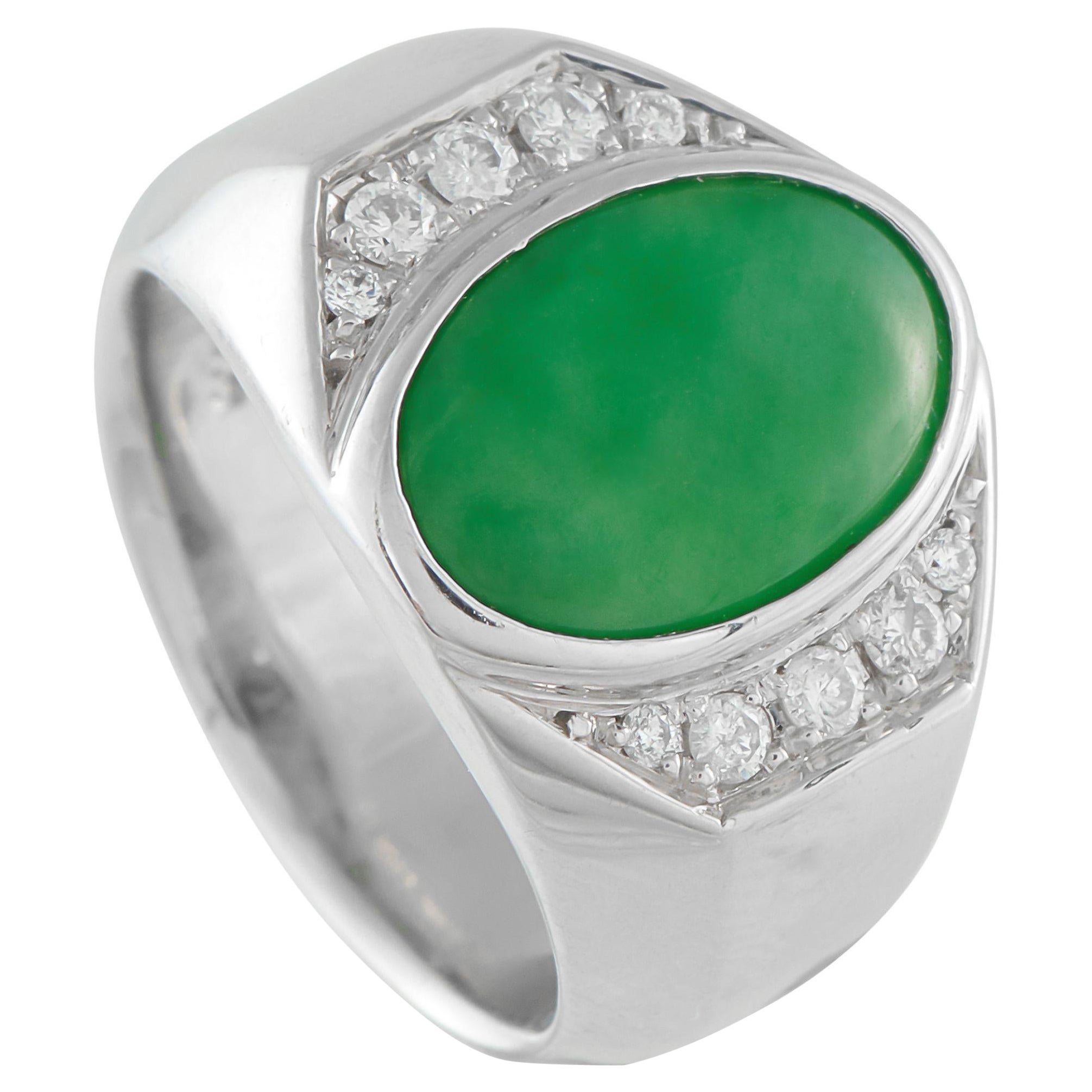 Anello in platino con diamante e giada da 0.23 carati