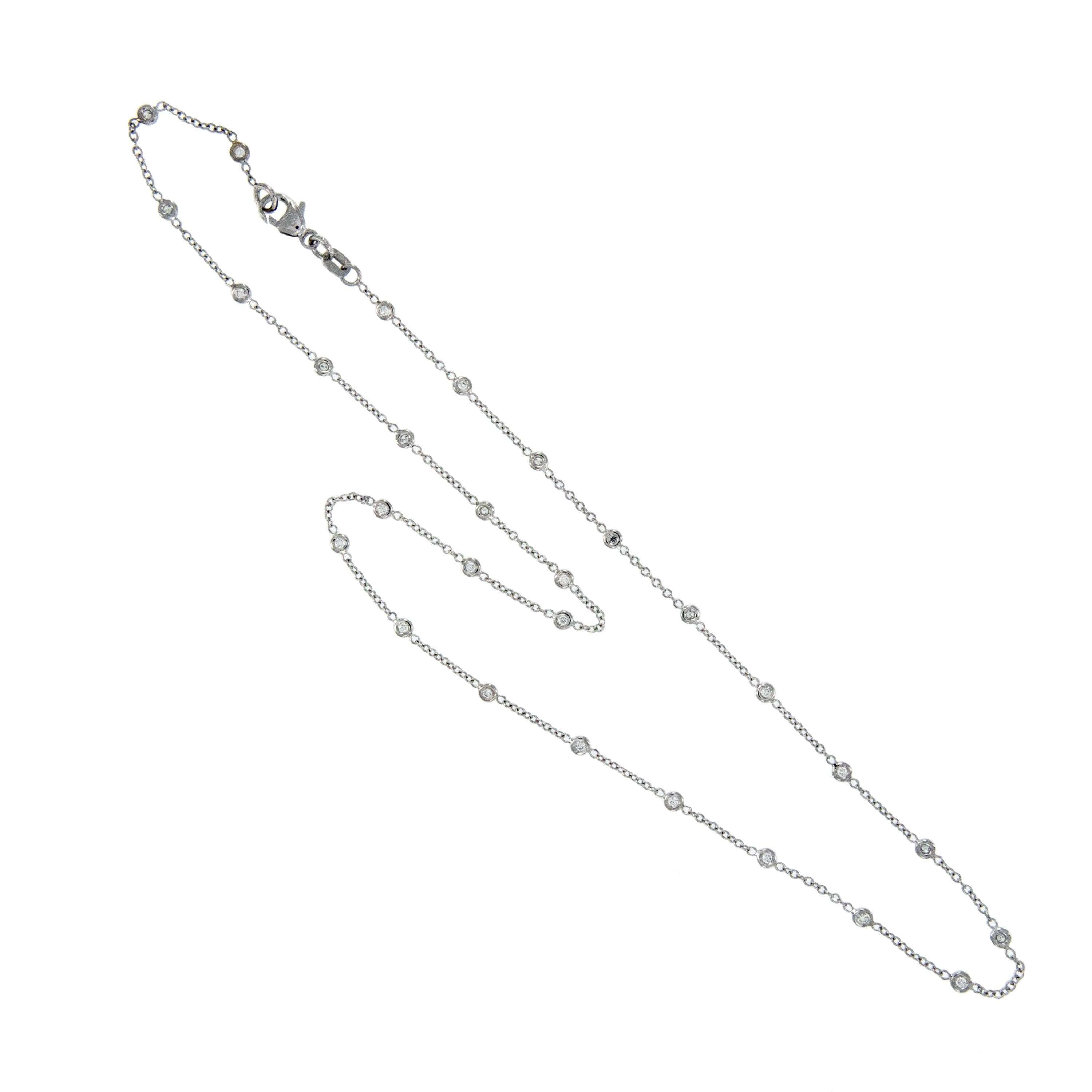Made of pure, noble platinum with twenty eight fine quality diamonds (VS clarity, F-G color) this station necklace stands the test of time! You can wear every day with jeans, yet it also looks fantastic dressed up on a little black dress! 16