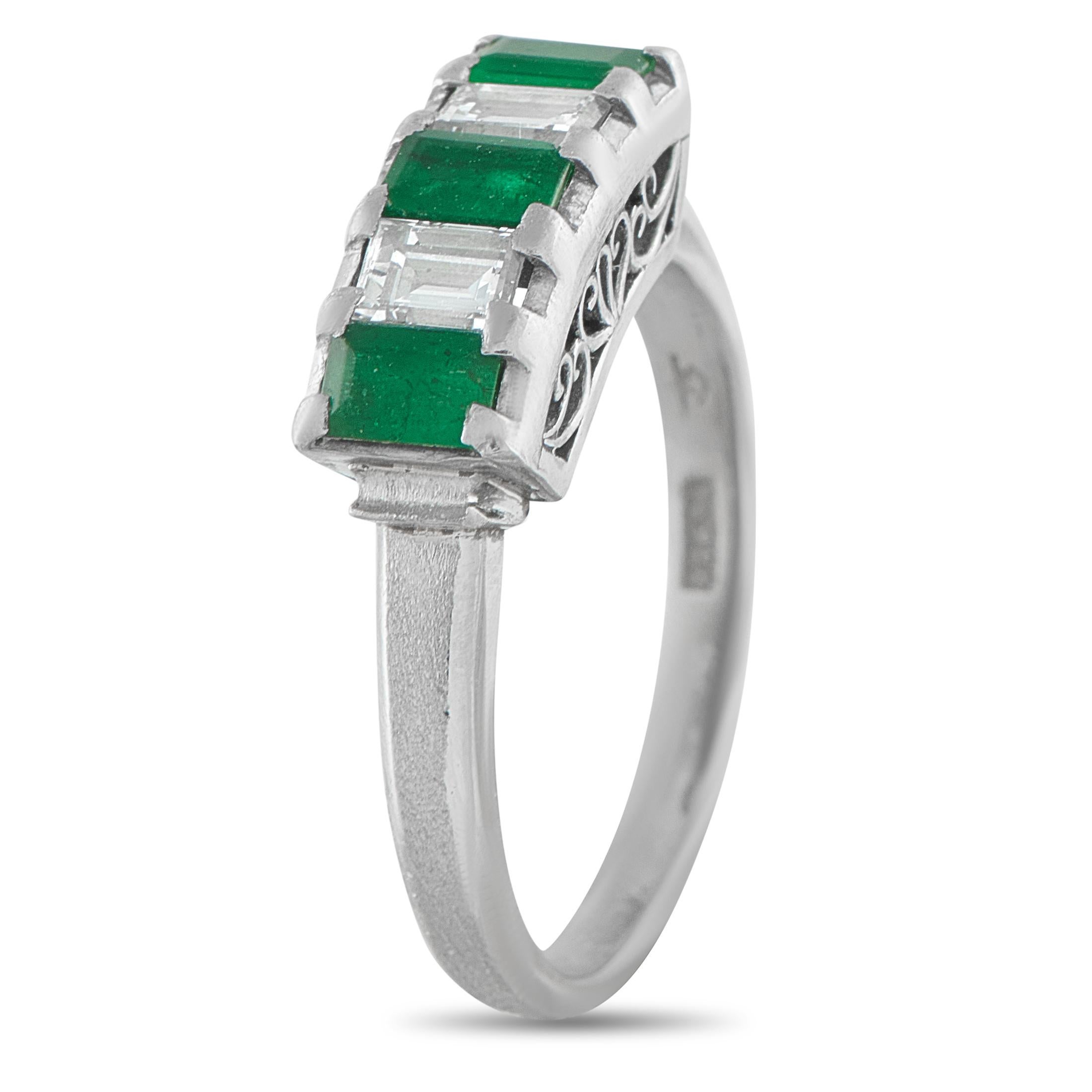 This ring presents an appealing silhouette of precious gems, set with heirloom precision. It features a five-stone centerpiece dramatically raised high on a platinum band. The row alternates three emerald-cut emeralds and two brilliant emerald-cut