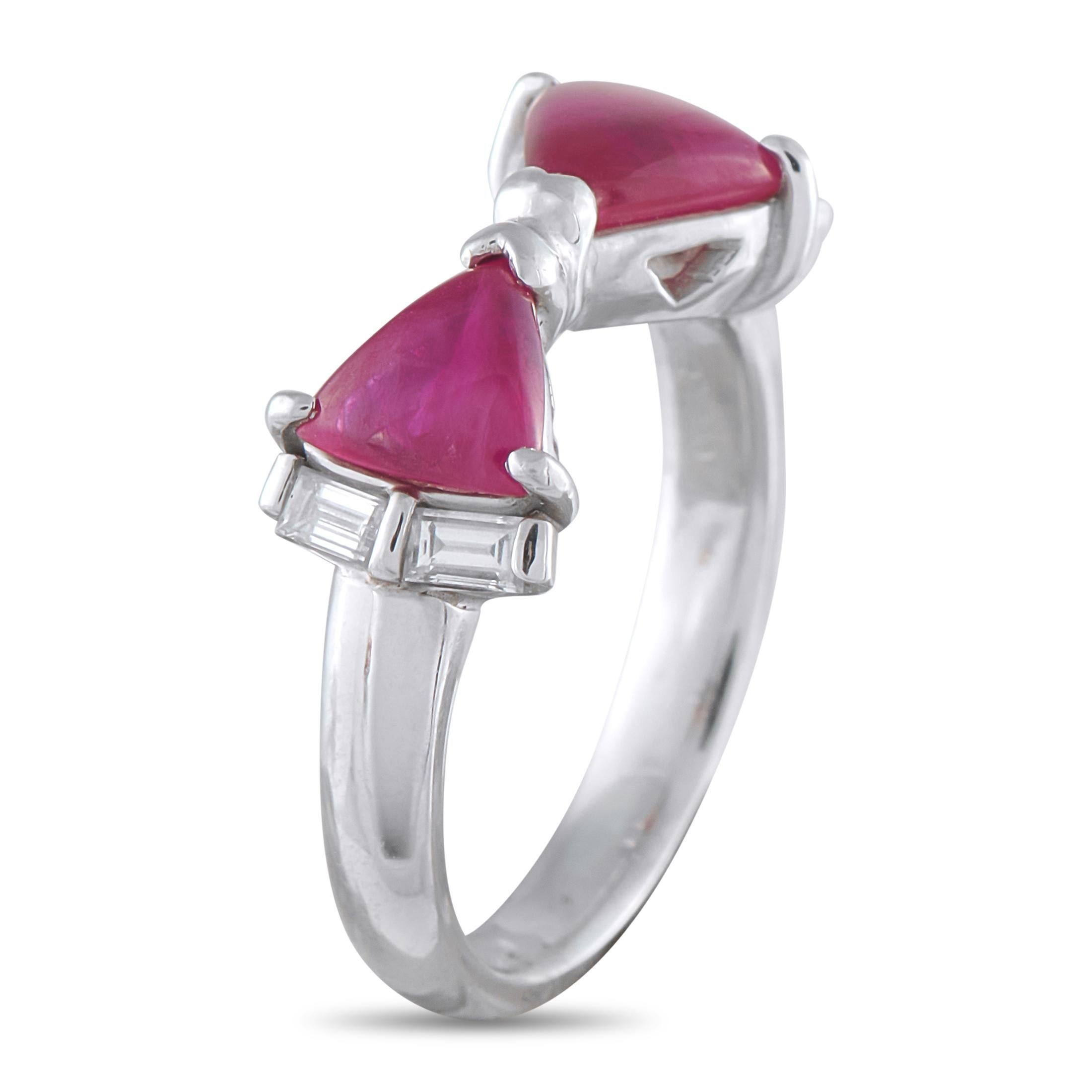 Fashioned in platinum, this ring holds two triangle-cut ruby cabochons totaling 2.37 carats, arranged point to point in a subtle bow-like form. The rubies are accented by pairs of baguette diamonds on each side, adding definition to the design. On