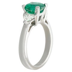 Anello in platino con diamante e smeraldo da 0,35 carati MF04-051826