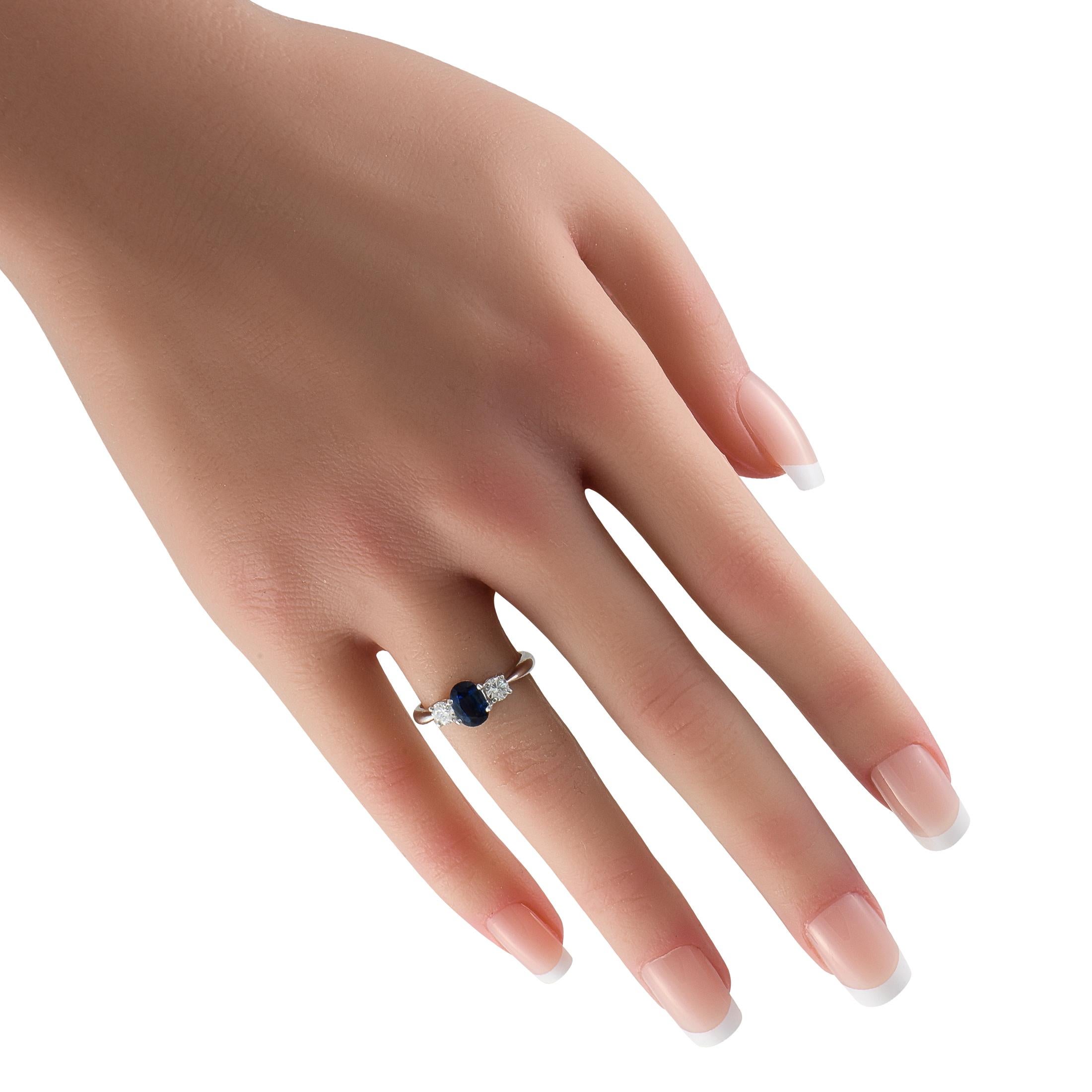 Round Cut Platinum 0.37ct Diamond and Sapphire Three Stone Ring