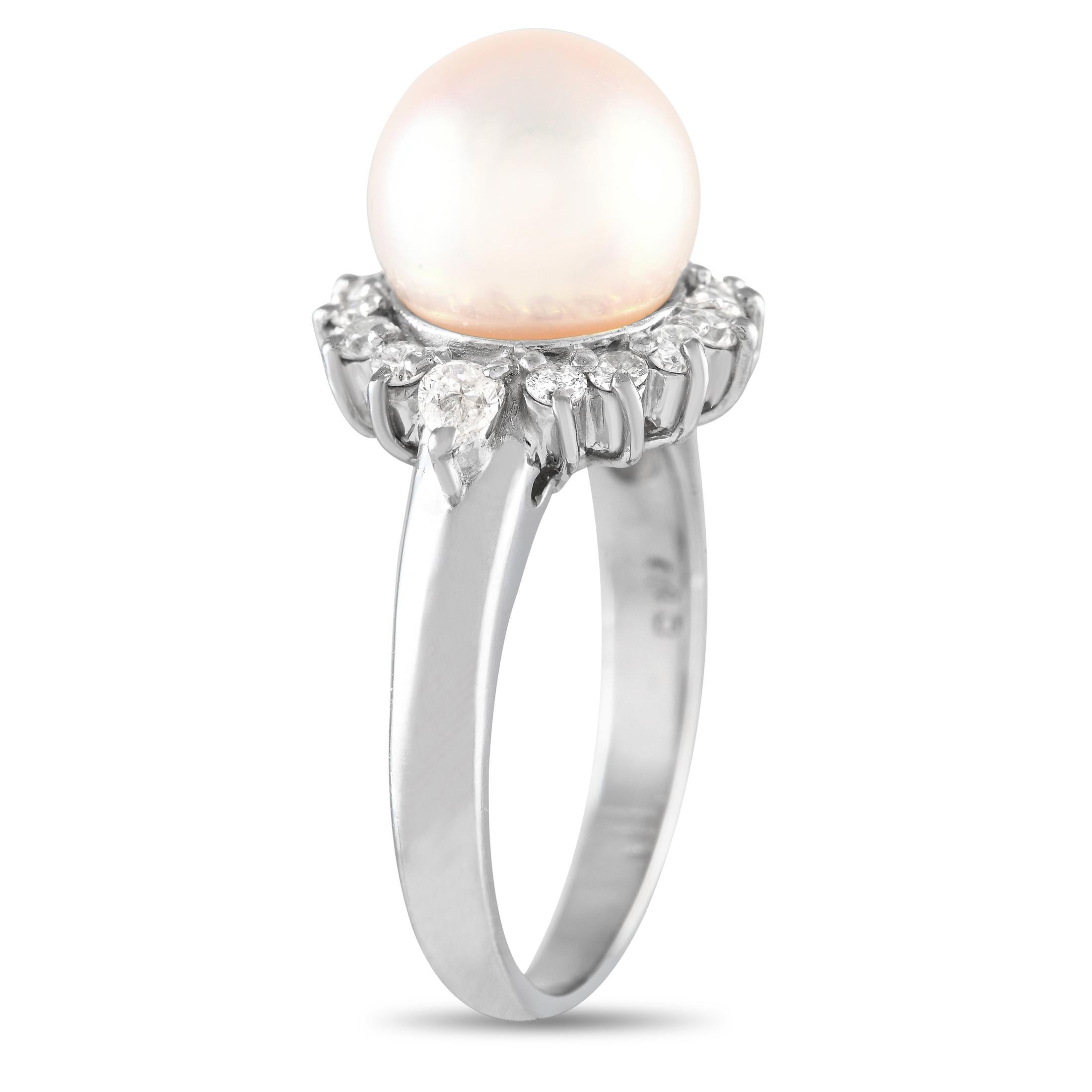 There's something about the enchanting refinement of this diamond and pearl ring. It features a polished platinum band topped with a 9-mm pearl surrounded by a sunburst halo of round diamonds. A pair of pear-cut diamonds flank the bright white gem,