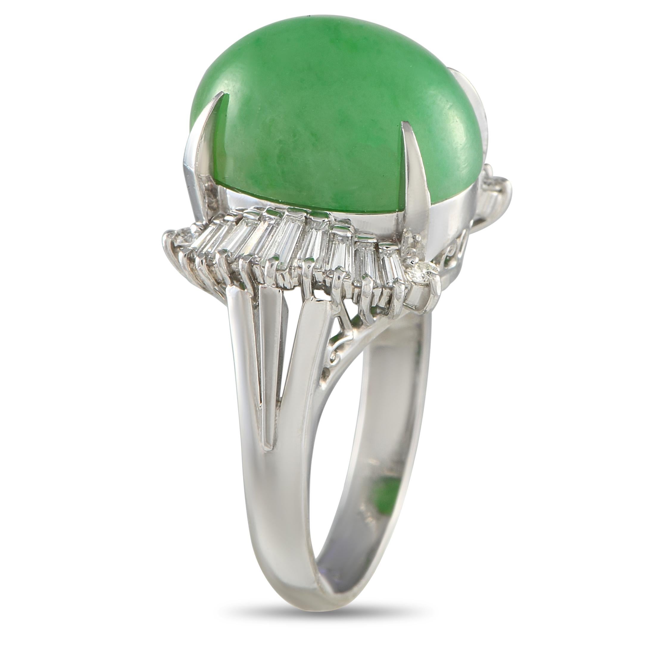 A breathtaking 9.94 carat Jade cabochon makes this luxury ring simply unforgettable. Bold and dynamic in design, the colorful center stone is elevated by sparkling Diamond accents totaling 0.45 carats and an ornate Platinum setting. This piece