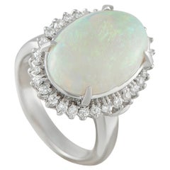 Platinum 0.45ct Diamond and Opal Ring MF29-101625