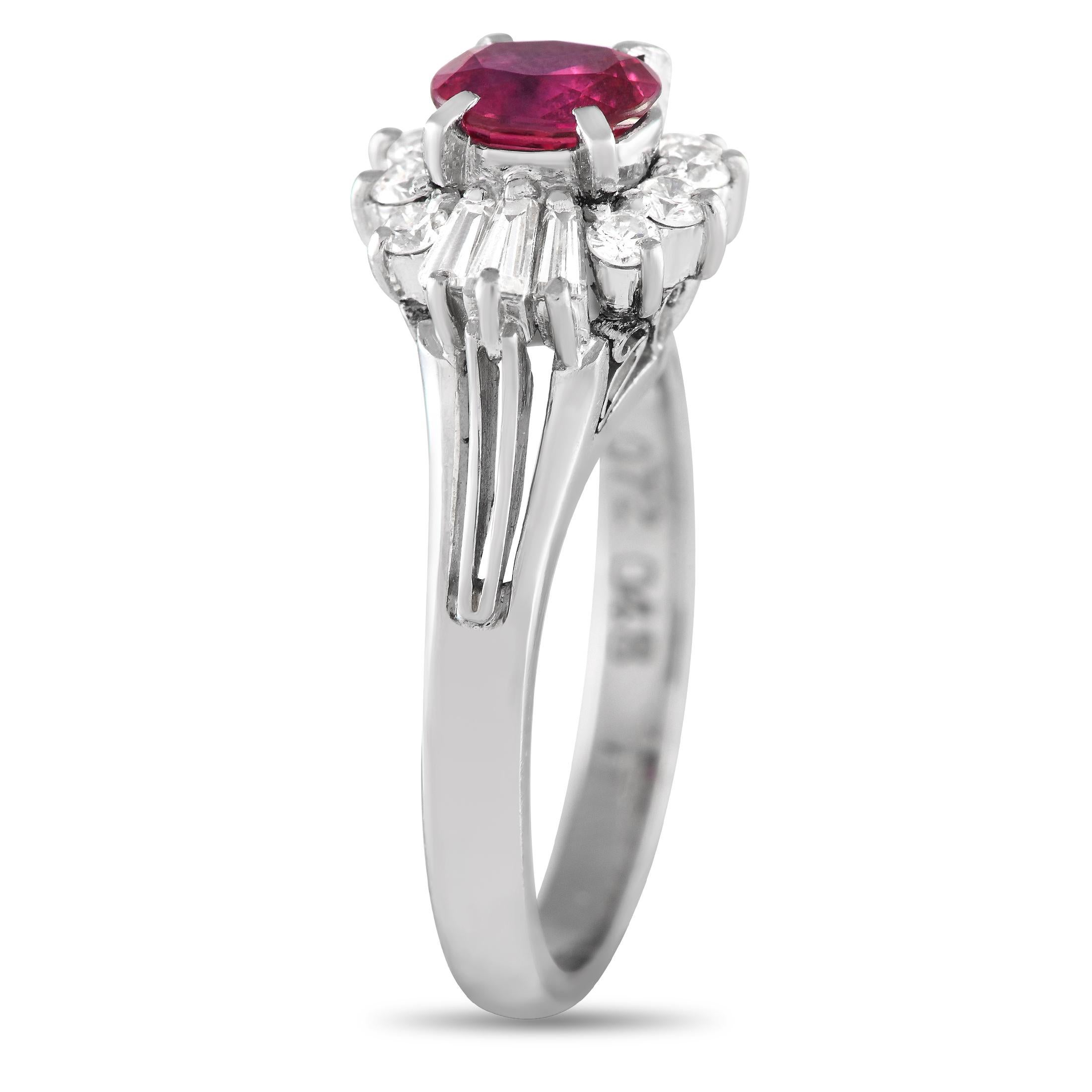 This sophisticated ring infused with Art Deco elegance is for an old soul seeking a ring with vintage flair. It offers a balanced arrangement of tapered baguette and round diamonds encircling a beautiful 0.72 ct oval ruby. The ring's top dimensions