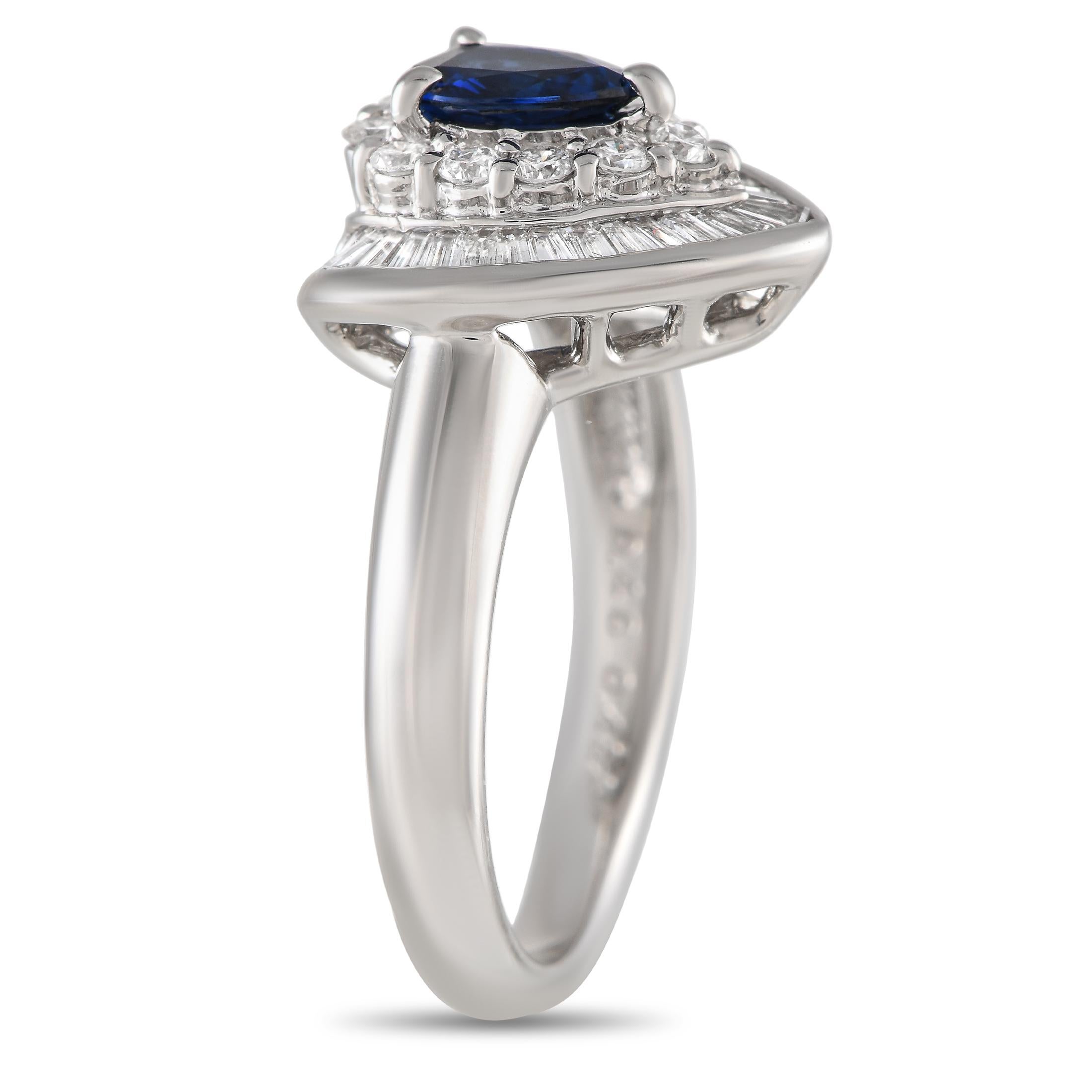 This rings dynamic platinum setting gives it a uniquely elegant point of view. Diamonds with a total weight of 0.49 carats cover the top of the design, while a 0.46 carat pear-cut sapphire adds extra luxury and visual impact. It features a 2mm wide