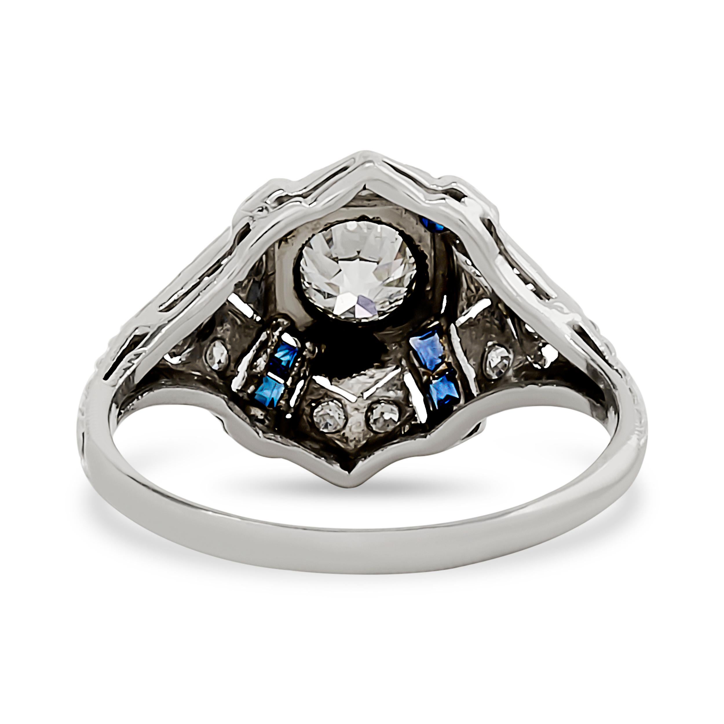 Round Cut Platinum 0.50 carat Diamond and Synthetic Sapphire Estate Engagement Ring For Sale