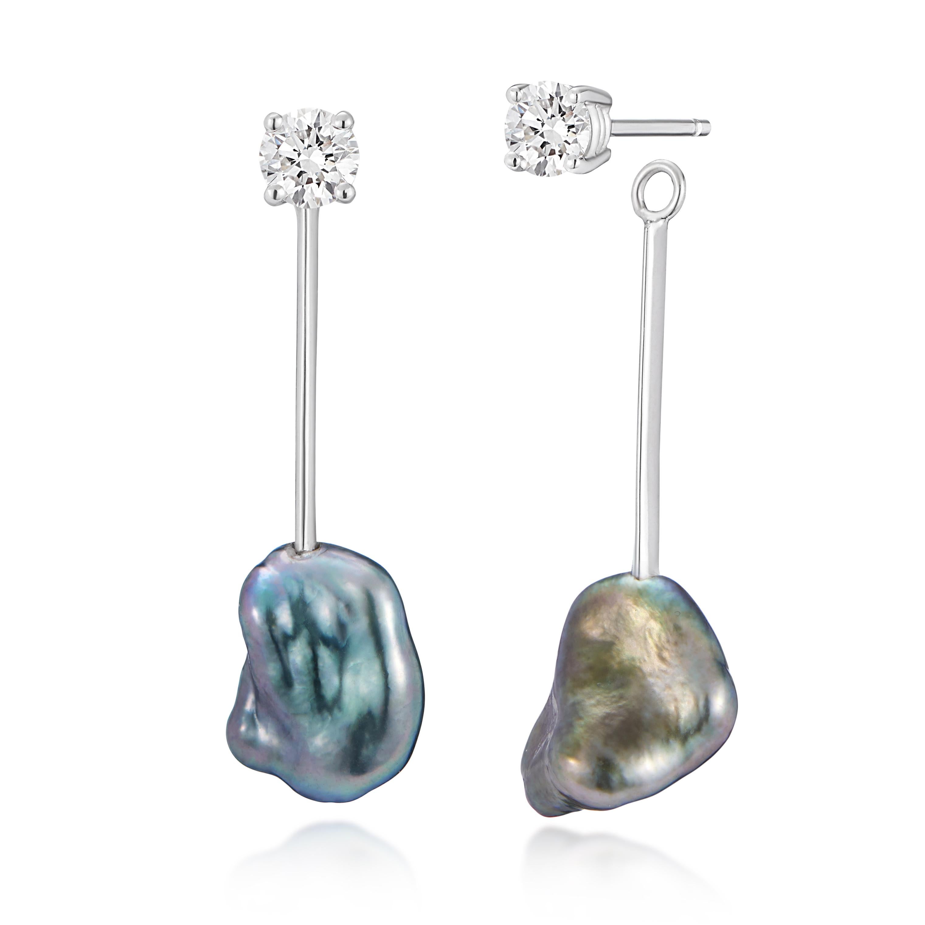 2 in 1 earrings - A pair of .5 Carat white diamond studs set in platinum with removable grey Keshi pearl drops also set in platinum. These earrings will take you from day to night and add that extra bit of sparkle to any outfit. 1 of the Keshi