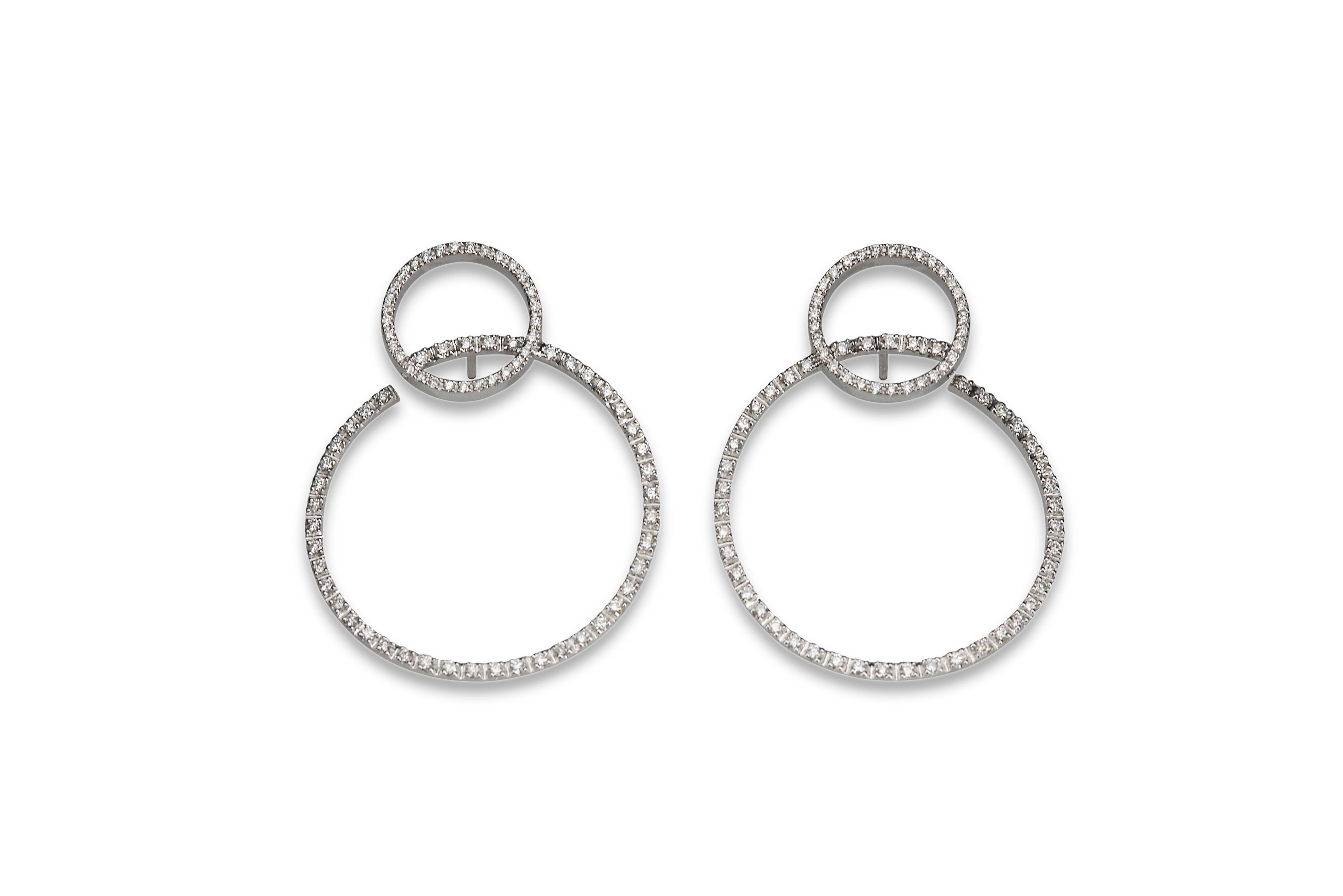 Women's Platinum 0.51 Karat G Color VS1 White Diamonds Modern Design Earrings For Sale