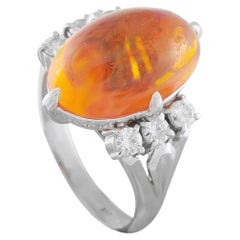 Anillo de platino con diamante y ópalo de 0,52 ct MF26-052126
