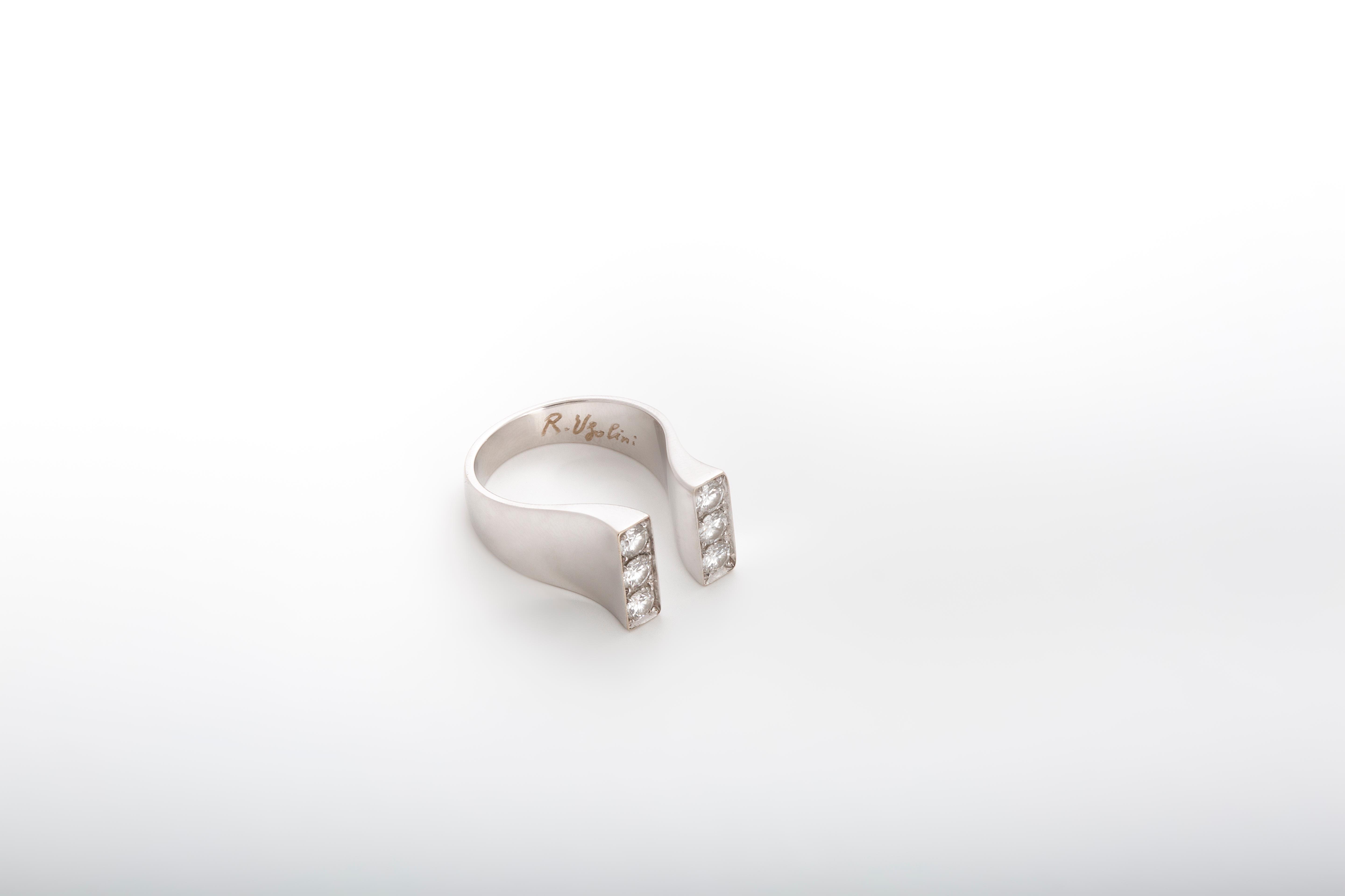 Platinum 0.54 Karat Brilliant Cut White Diamonds Magnet Engagement Design Ring In New Condition For Sale In Rome, IT