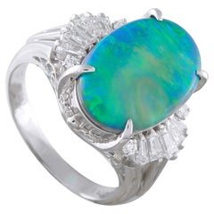 Platinring mit 0,54ct Diamant und schwarzem Opal