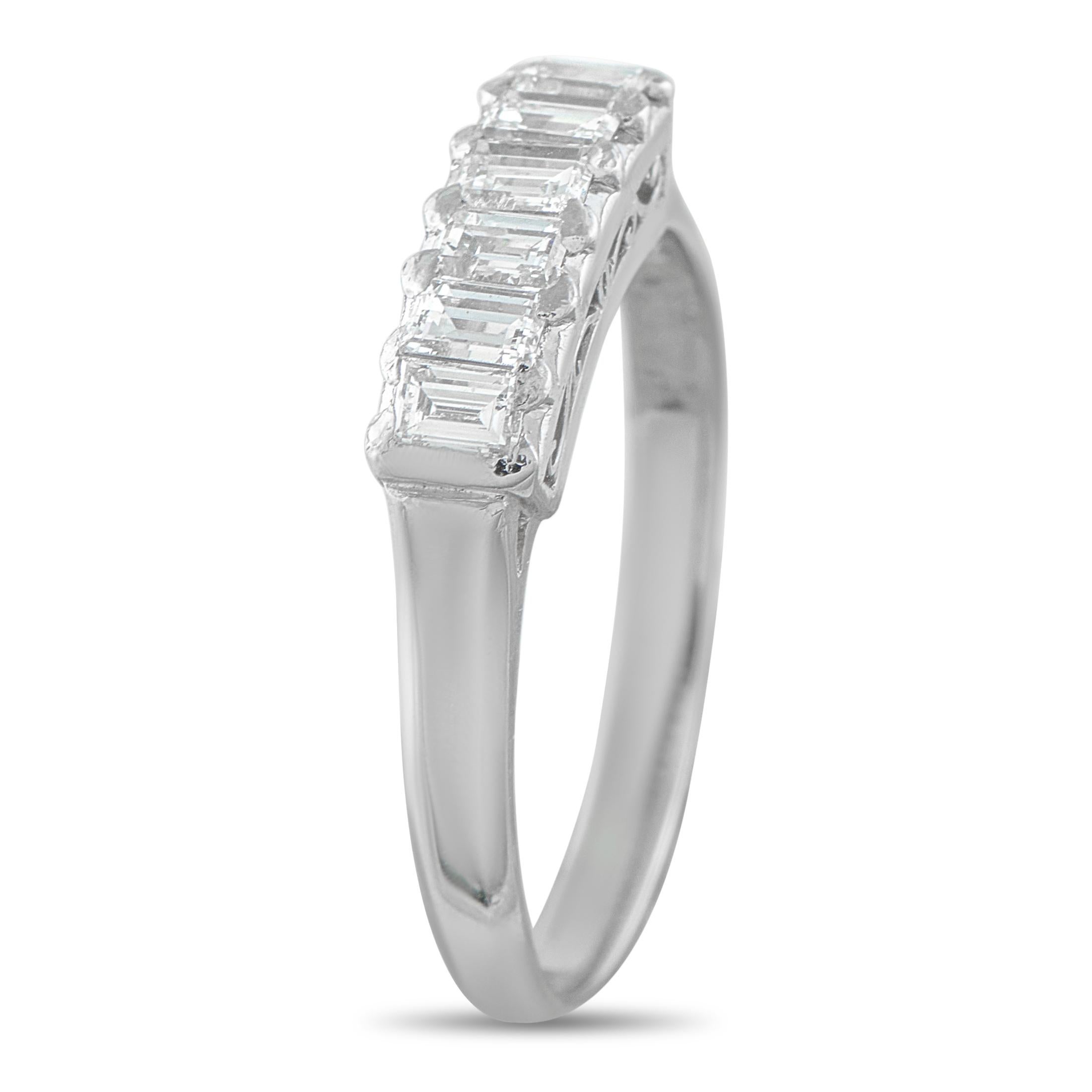 This luxury ring is elegant, understated, and ideal for everyday wear. A detailed Platinum setting adds visual impact to the overall design. At the center, a series of Diamonds totaling 0.54 carats offer endless sparkle. With a 2mm wide band and a