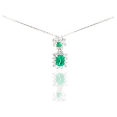 Platinum 0.55 Carat Emerald Diamond Halo Drop Pendant Necklace