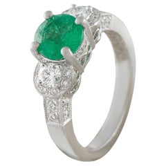 Bague en platine 0,56ct diamant et émeraude MF35-051826