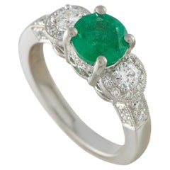 Bague en platine 0,56ct diamant et émeraude MF35-051826