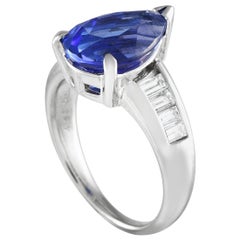 Platinum 0.60 ct Diamond and 4.38 ct Tanzanite Ring Platinum 0.60 ct Diamond and 4.38 ct Tanzanite Ring