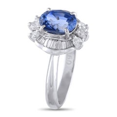 Platinum 0.60 ct Diamond and Sapphire Ring