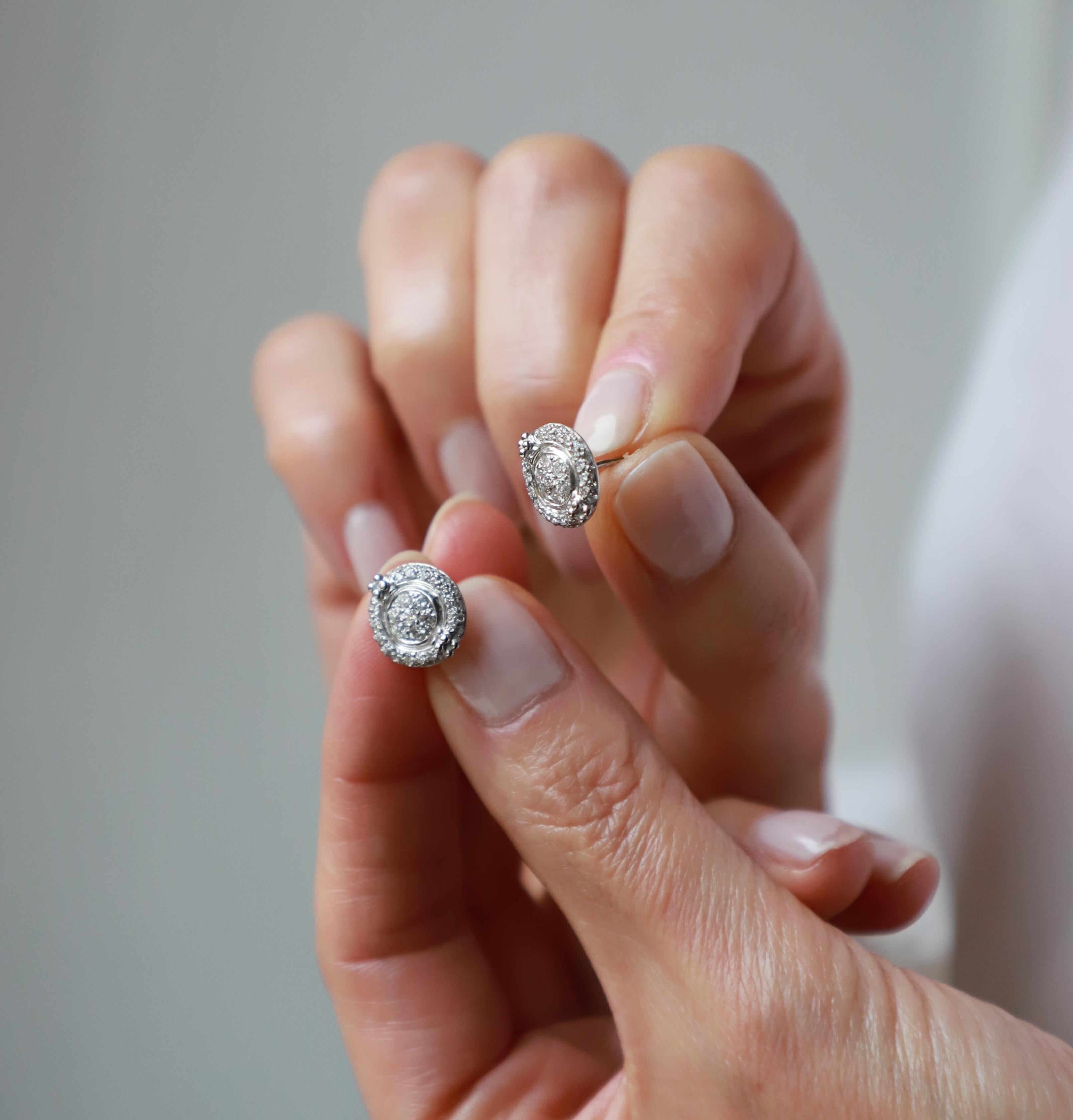Platinum 0.60 Karats Brilliant Cut White Diamonds Elegant Stud Design Earrings For Sale 3