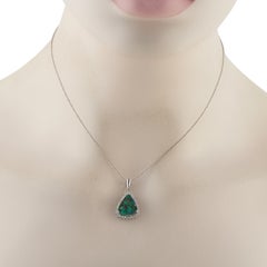 Collar de platino con diamantes de 0,60 ct y ópalo