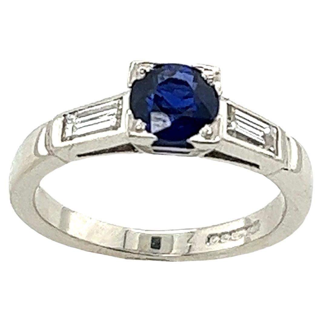 Platinum 0.60ct Sapphire & Diamond Ring Set With 2 Baguettes Diamonds on Sides For Sale