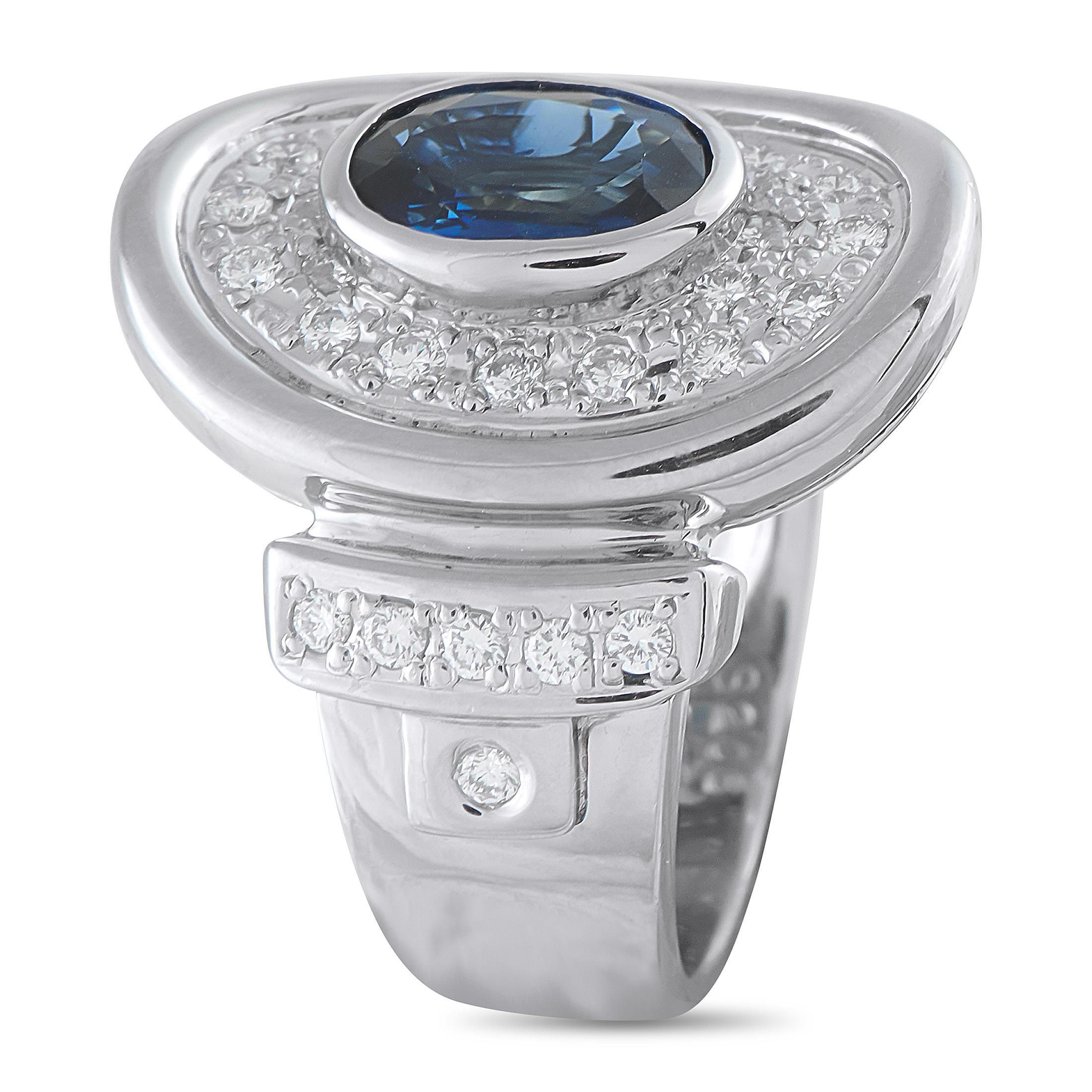 A uniquely elegant design makes this ring simply unforgettable. The circular Platinum setting is highlighted by inset Diamonds totaling 0.61 carats. At the center, a 2.06 carat Sapphire serves as a stunning focal point. It features a 7mm wide band