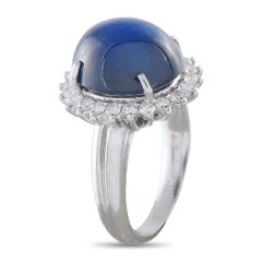 Anello in platino con diamante e zaffiro da 0,62 carati MF08-030226