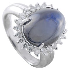 Anello in platino con diamante e zaffiro da 0,62 carati MF08-030226
