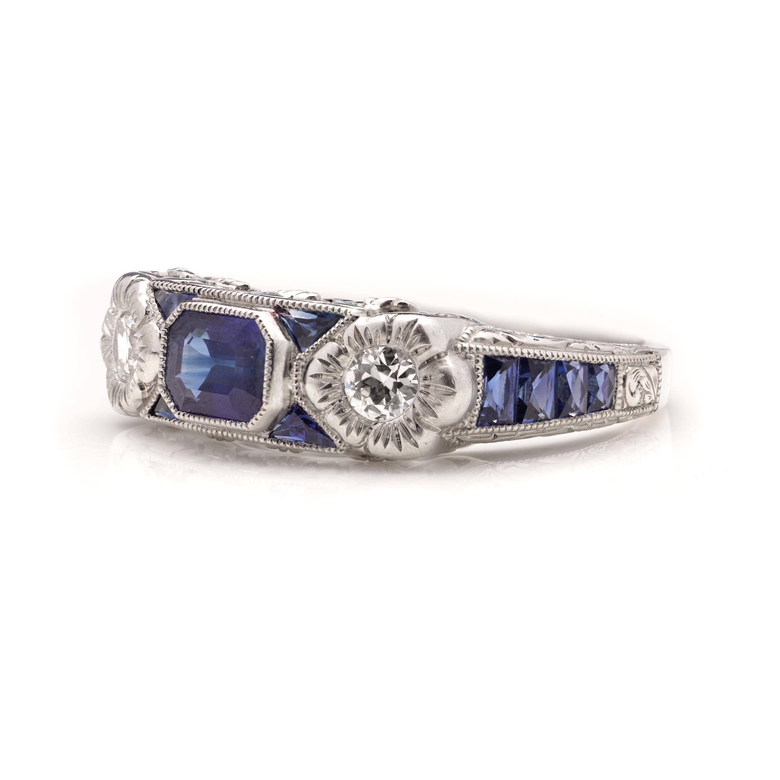 Emerald Cut Platinum 0.63 carats of Emerald - cut Blue Sapphire ring For Sale